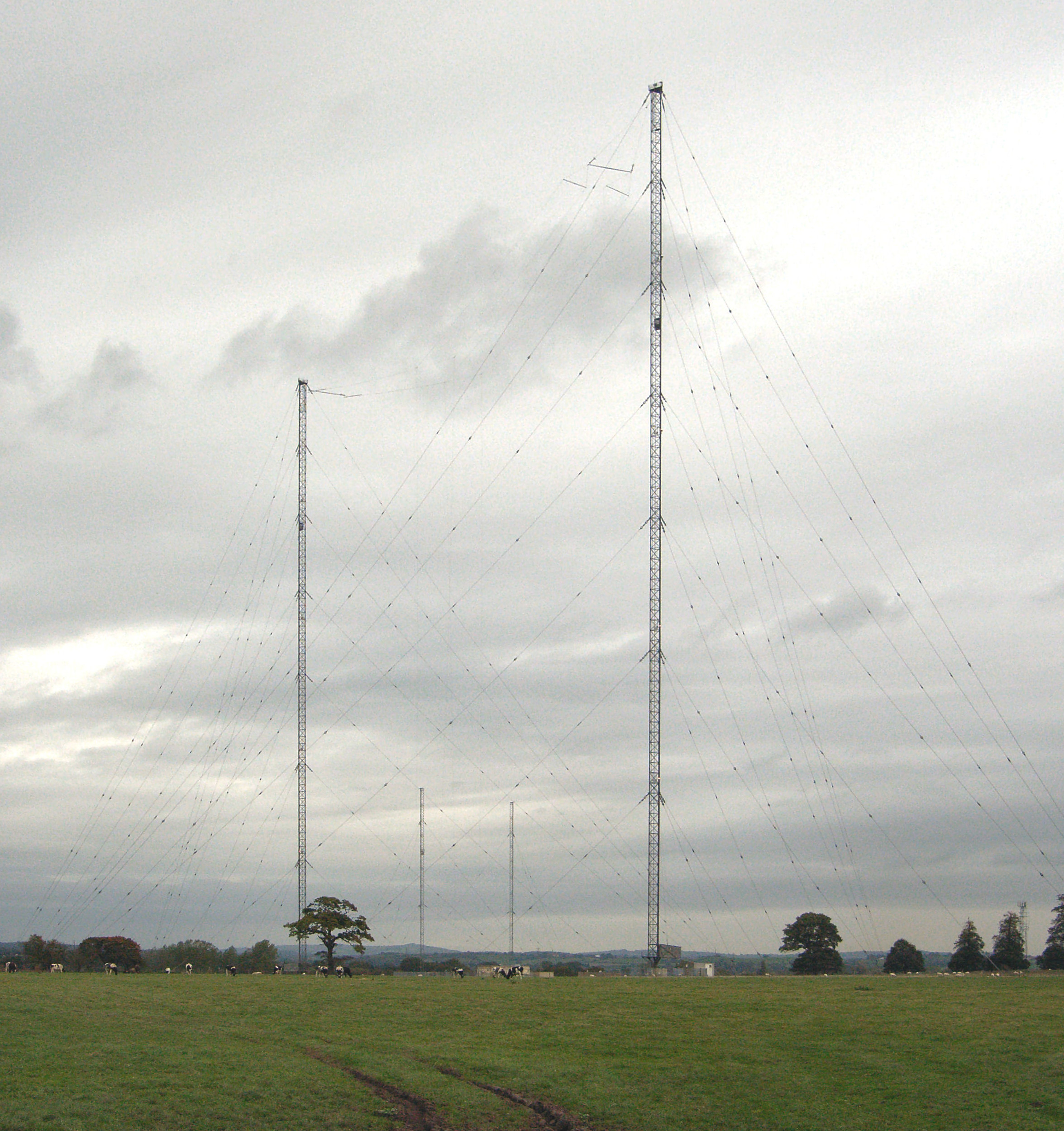 The long-wave transmitting masts at Droitwich (Wychbold), Worcestershire, rising against an open sky.